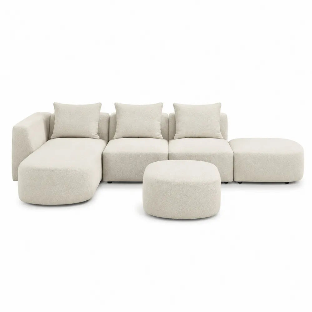 Beżowa sofa modułowa z tkaniny z szezlongiem i pufem
